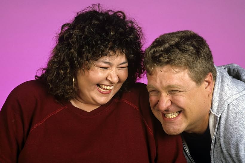 John Goodman and Roseanne Barr in Roseanne (1988)