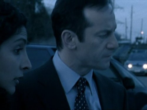 Jason Isaacs and Rahnuma Panthaky in The State Within (2006)