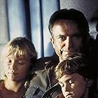 Sam Neill, Ariana Richards, and Joseph Mazzello in Jurassic Park (1993)