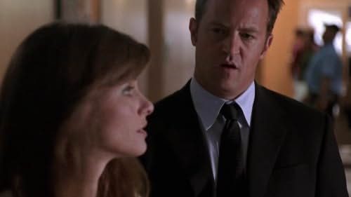 Amanda Peet and Matthew Perry in Studio 60 on the Sunset Strip (2006)