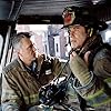 John Travolta and Mark Yant in Ladder 49 (2004)