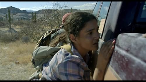 A group of people trying to cross the border from Mexico into the United States encounter a man who has taken border patrol duties into his own hands.