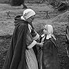 Chantal Gozzi and Simone Signoret in Les sorcières de Salem (1957)