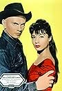 Yul Brynner and Rosenda Monteros in Die glorreichen Sieben (1960)