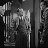 Halliwell Hobbes, Gavin Muir, and Frederick Worlock in Sherlock Holmes Faces Death (1943)