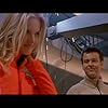 Rupert Graves and Bridgette Wilson-Sampras in Extreme Ops (2002)