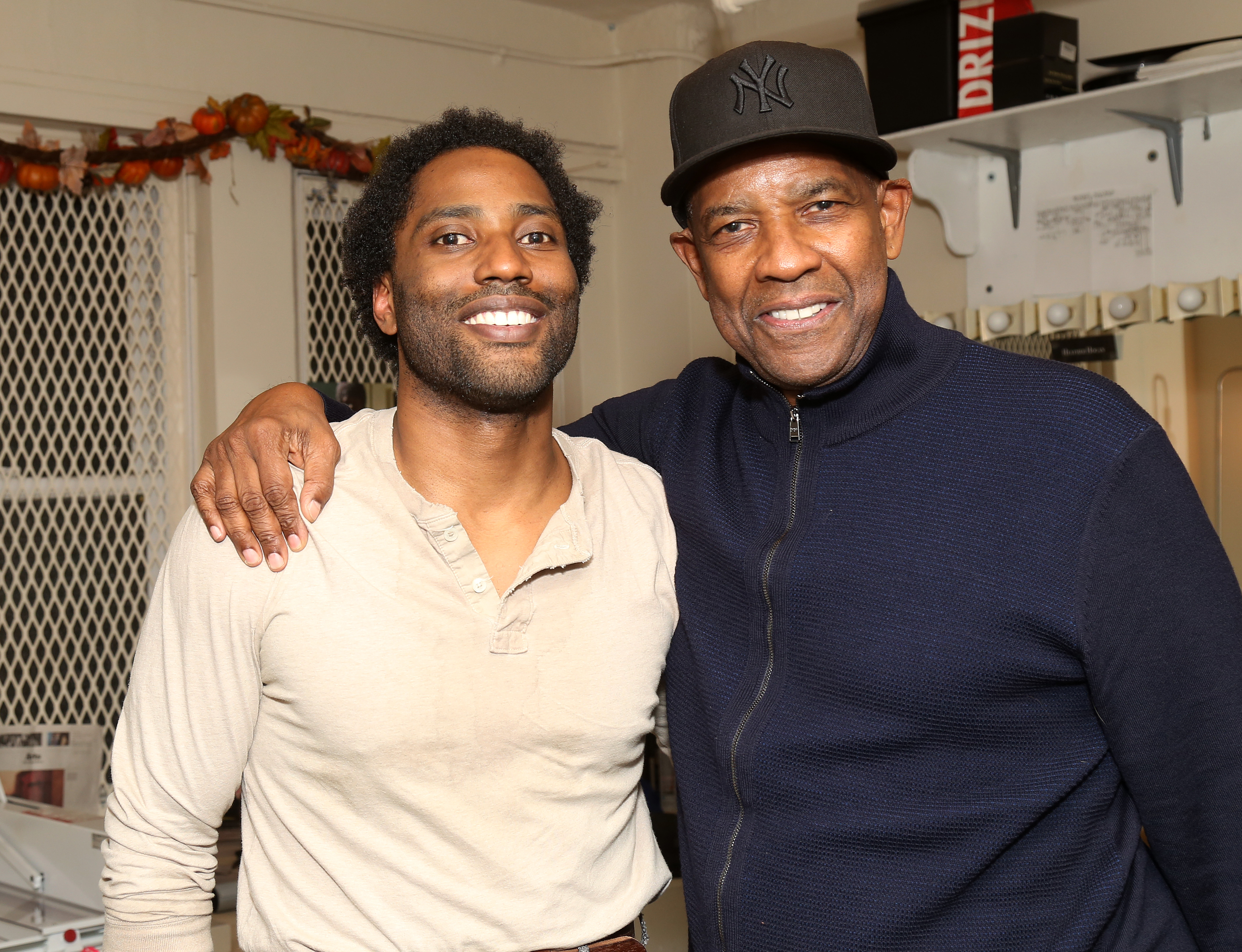 Denzel Washington and John David Washington at an event for The Piano Lesson (2024)