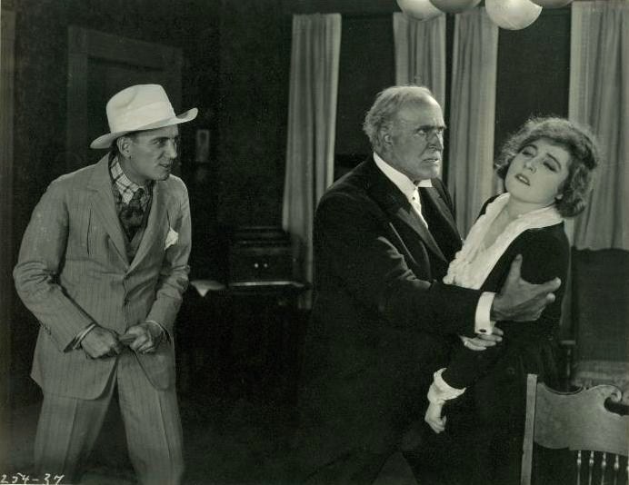 Ethel Clayton, Theodore Roberts, and Charles West in The Girl Who Came Back (1918)