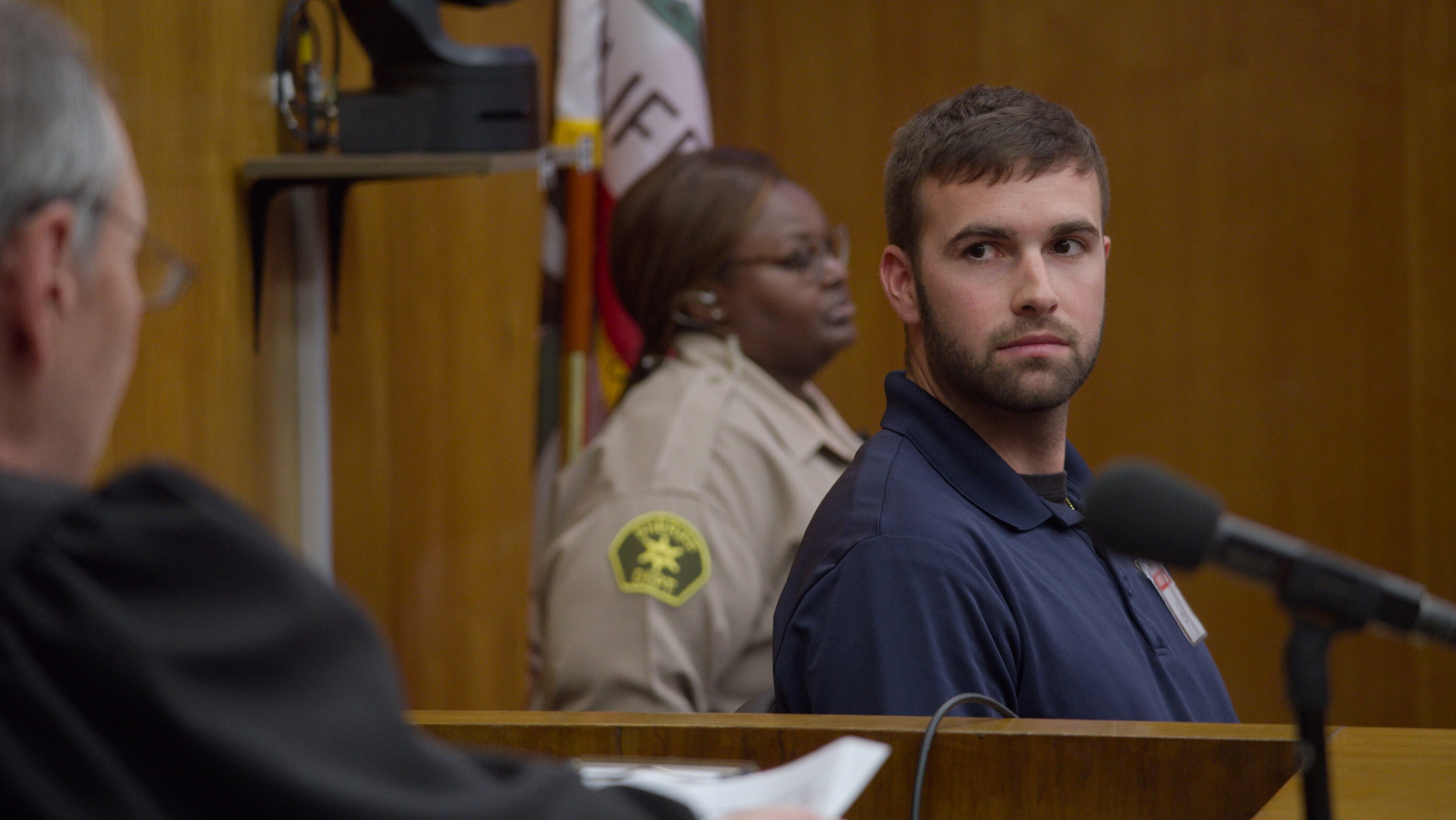 Ronald Gladden and Rashida Olayiwola in Jury Duty (2023)