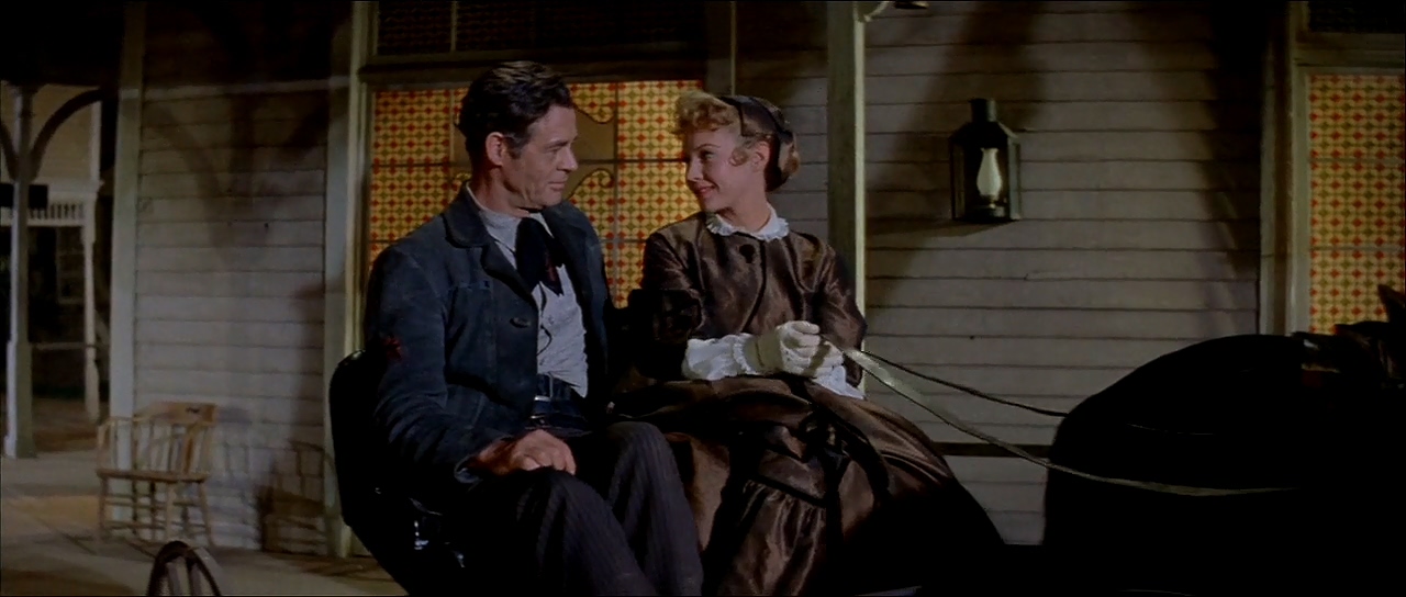 Virginia Mayo and Robert Ryan in The Proud Ones (1956)