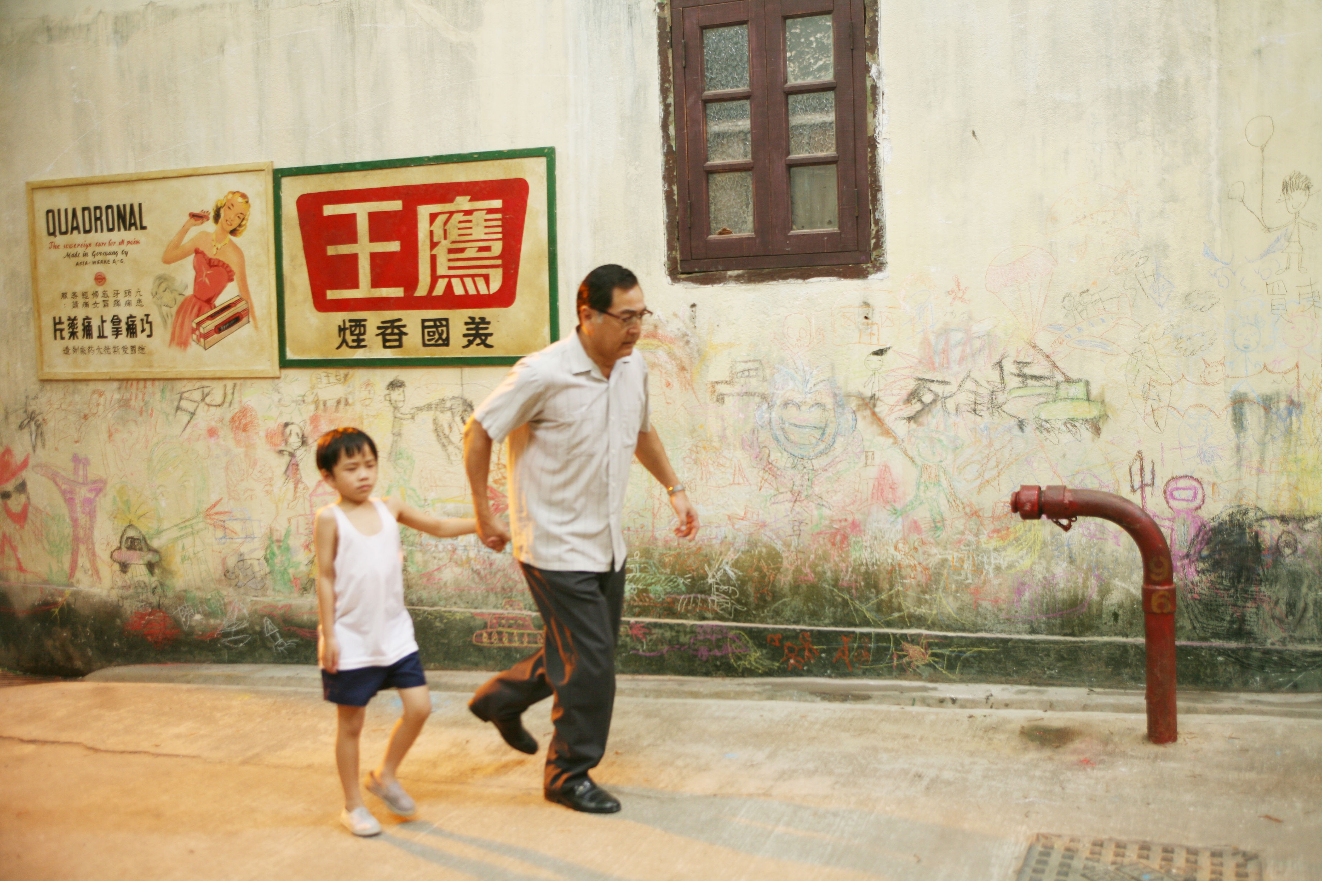 Paul Chun and Buzz Chung in Echoes of the Rainbow (2010)