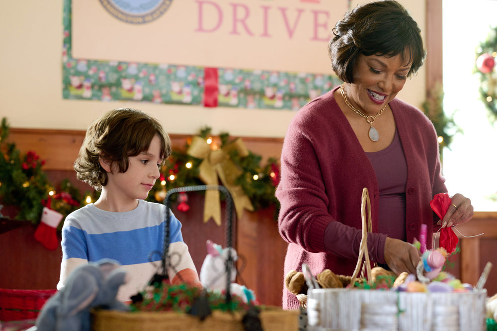 Lynn Whitfield and Azriel Dalman in We Need A Little Christmas (2022)