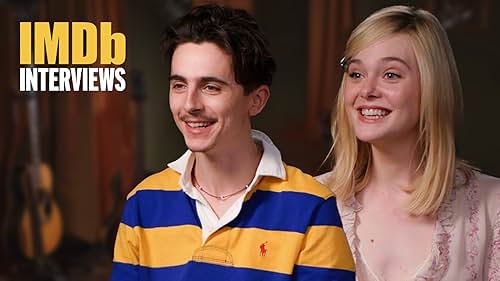 'A Complete Unknown' stars Timothée Chalamet, Elle Fanning, Monica Barbaro, and Edward Norton discuss their experiences portraying iconic figures from the 1960s folk music scene. Chalamet, who plays Bob Dylan, reveals how the legendary singer-songwriter contributed directly to the script, even crafting lines that made it on screen. Barbaro shares insights from her conversation with Joan Baez, whom she portrays, highlighting the folk singer's honesty and generosity. Norton, taking on the role of Pete Seeger, reflects on the deceptive simplicity of these musicians' performances, emphasizing the virtuosity required to recreate their seemingly effortless stage presence. The cast also touches on their mentors in the industry and the collaborative atmosphere on set, praising the live performances that allowed for spontaneity and authentic energy during filming.