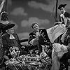 John Carradine, Charles Laughton, Barbara Britton, William Farnum, and Lumsden Hare in Captain Kidd (1945)