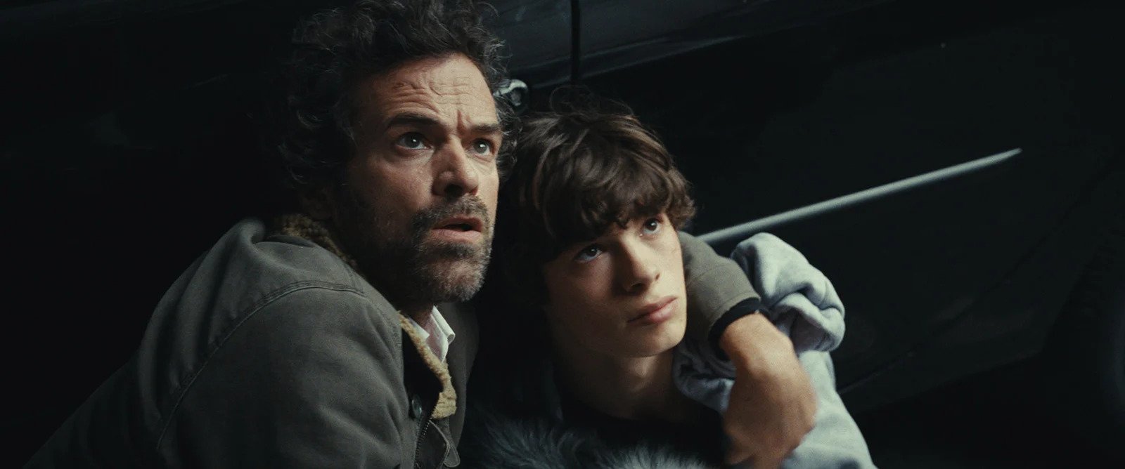 Romain Duris and Paul Kircher in The Animal Kingdom (2023)