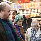 Louis C.K., Ursula Parker, and Hadley Delany in Louie (2010)