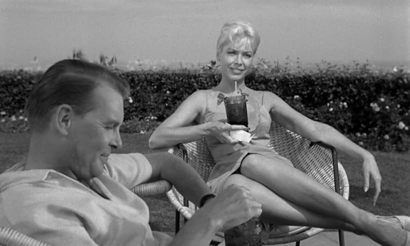 Kate Manx and Robert Wark in Private Property (1960)