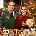 Victor Webster and Lori Loughlin in Homegrown Christmas (2018)