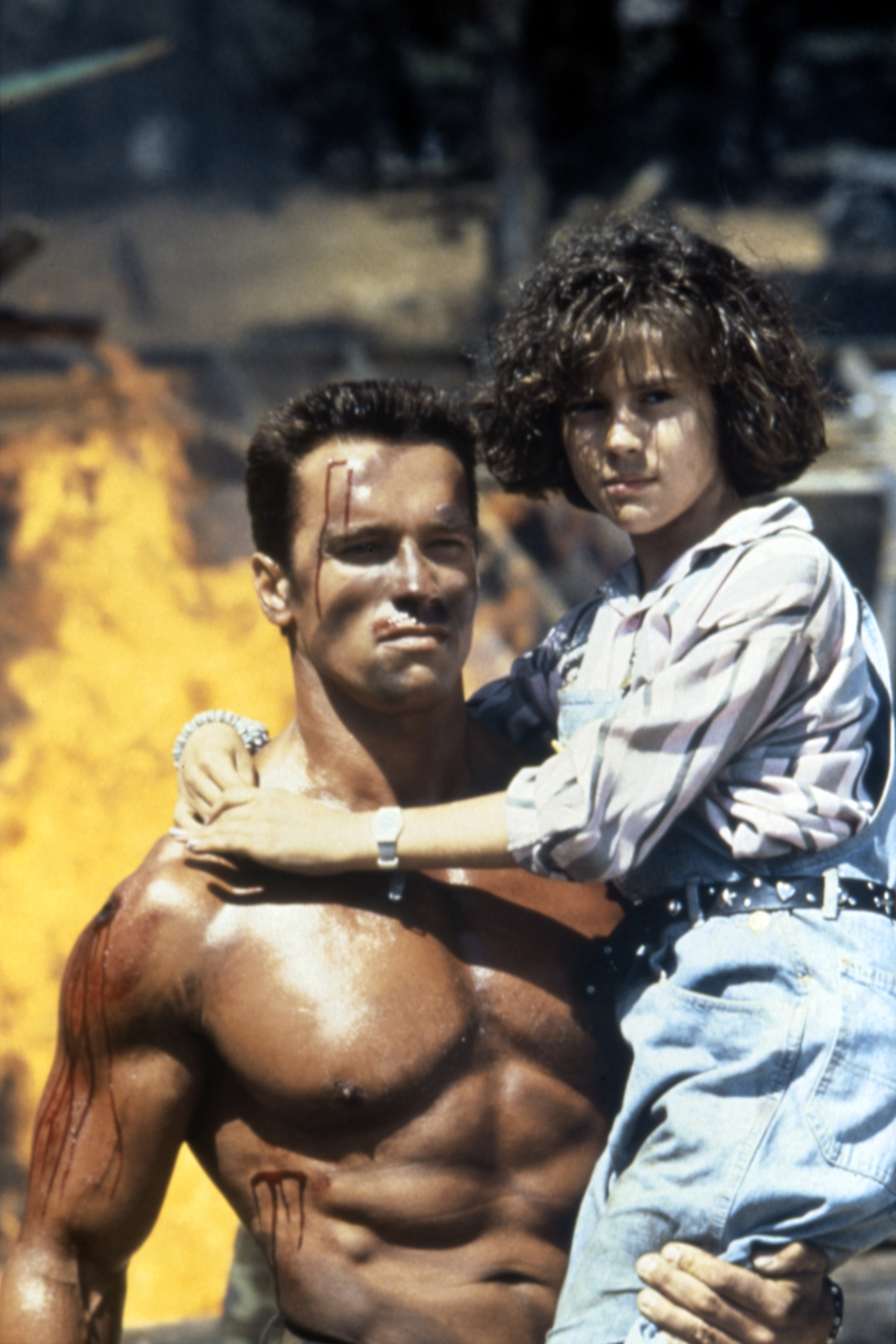 Alyssa Milano and Arnold Schwarzenegger in Commando (1985)