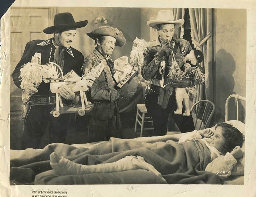 Raymond Hatton, Robert Livingston, Patsy Parsons, and Duncan Renaldo in Heroes of the Saddle (1940)