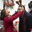 Liza Huget and Harry Lennix in A Christmas Together with You (2021)