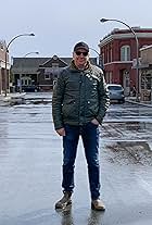 Dan Hermansen standing in Smallville set (Superman & Lois)