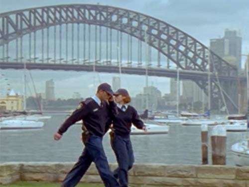 Raelee Hill and Brett Partridge in Water Rats (1996)