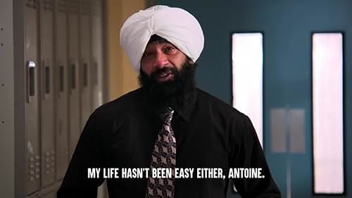 Mr.Singh talks to a student