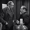 Lloyd Corrigan and Dennis Hoey in She-Wolf of London (1946)