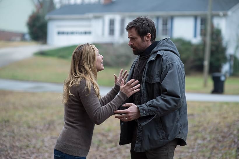 Maria Bello and Hugh Jackman in Prisoners (2013)