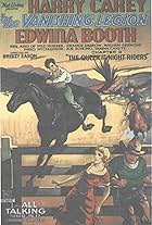 Harry Carey, Edwina Booth, Frankie Darro, and Rex in The Vanishing Legion (1931)