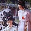 Huimin Tao and Jing Xia in Hong lou meng (1988)