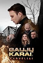 Gabriele Ladygaite, Vaidas Marsalka, Emilis Pavilionis, and Karolis Kasperavicius in Gauju Karai. Karveliai (2021)