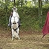 Angel Coulby and Tomiwa Edun in Merlin (2008)