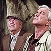 Leslie Nielsen and Ray Milland in Cave In! (1983)