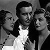 Tala Birell, John Boles, and Doris Nolan in As Good as Married (1937)