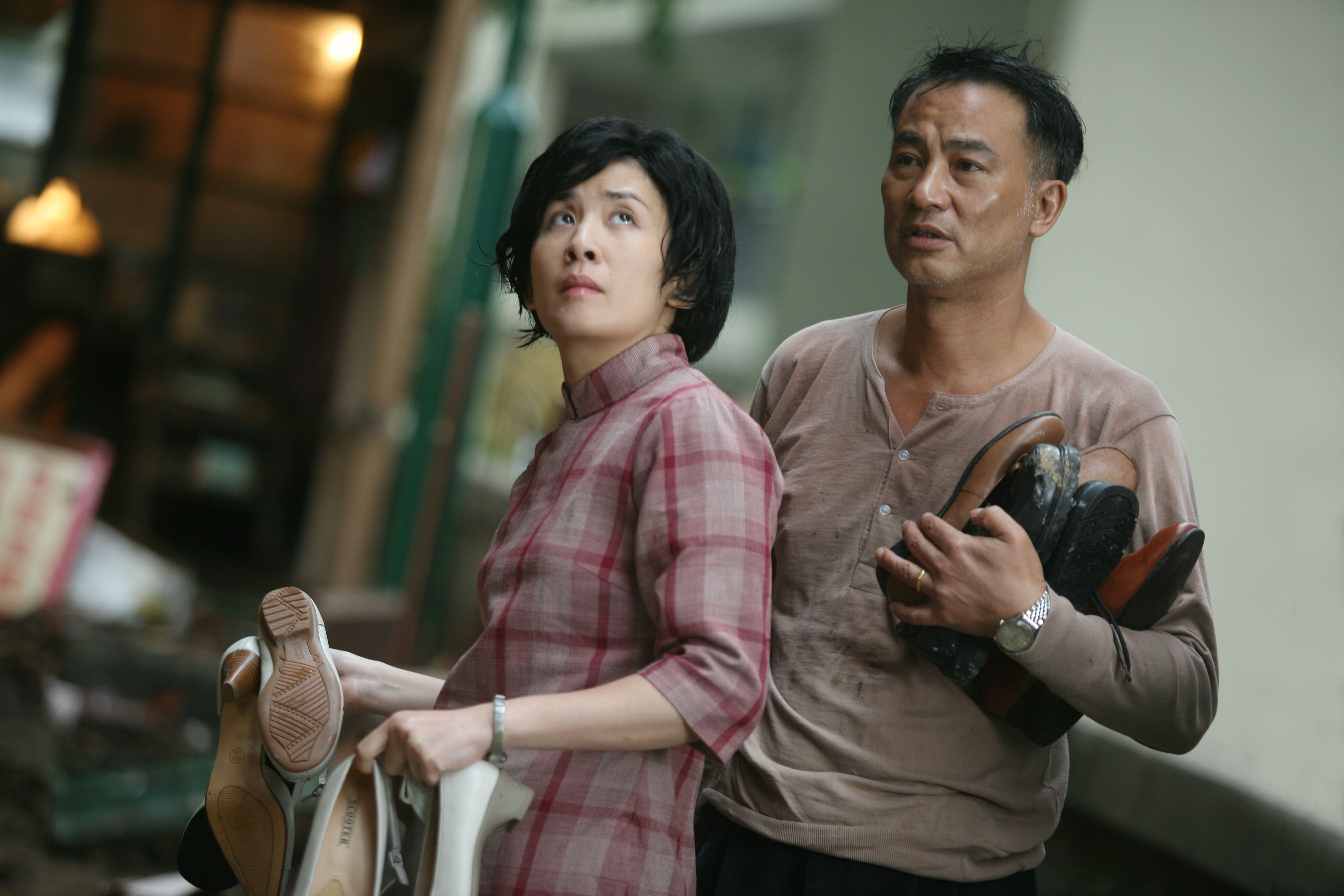 Sandra Kwan Yue Ng and Simon Yam in Echoes of the Rainbow (2010)