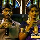 Sneha and Dhanush in Pudhu Pettai (2006)