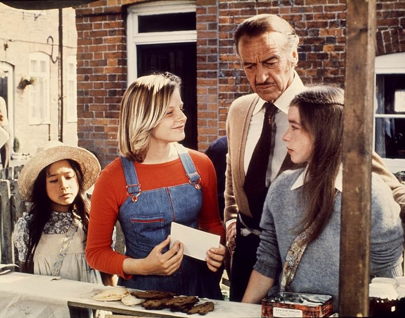 David Niven, Jodie Foster, Veronica Quilligan, and Sarah Tamakuni in Candleshoe (1977)