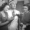 Roscoe Karns, Lynne Roberts, and Mary Hart in Everything's on Ice (1939)