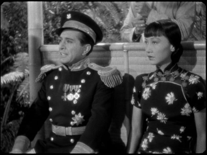 J. Carrol Naish and Anna May Wong in Island of Lost Men (1939)