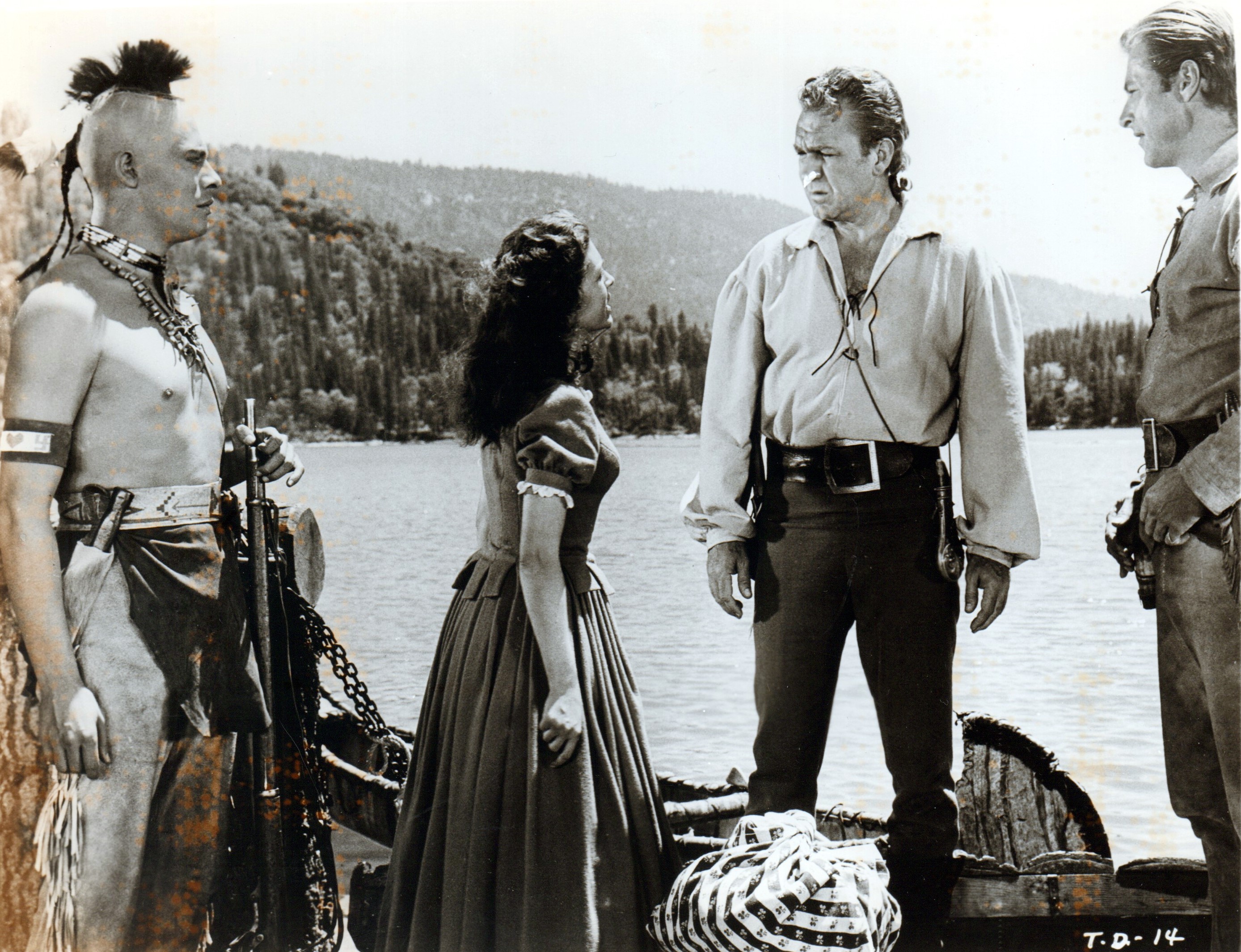 Lex Barker, Cathy O'Donnell, Carlos Rivas, and Forrest Tucker in The Deerslayer (1957)