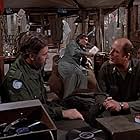 Alan Alda, David Ogden Stiers, and George Innes in M*A*S*H (1972)