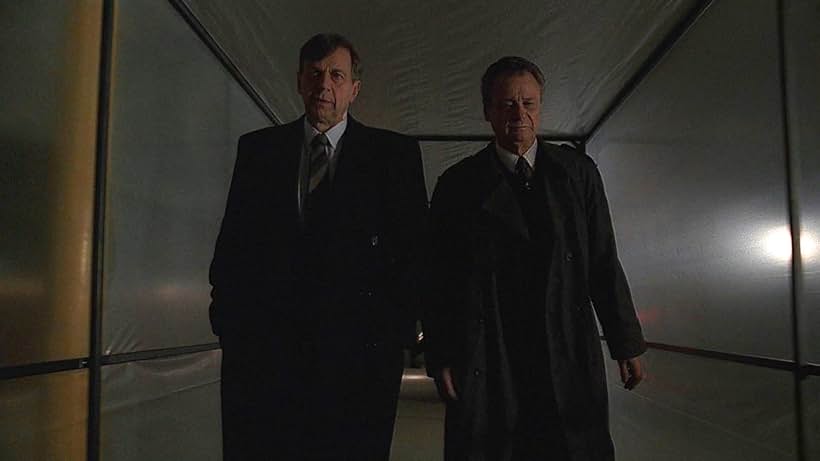 William B. Davis and Jerry Hardin in The X-Files (1993)