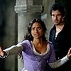 Angel Coulby and Santiago Cabrera in Merlin (2008)