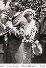 Stuart Holmes, Tom Moore, Lottie Pickford, and Alison Skipworth in Into the Jungle (1912)