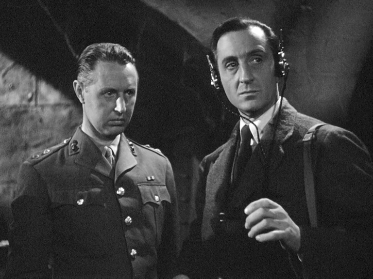 Basil Rathbone and Vernon Downing in Sherlock Holmes Faces Death (1943)