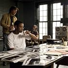 Russell Crowe, Denzel Washington, and Yul Vazquez in American Gangster (2007)