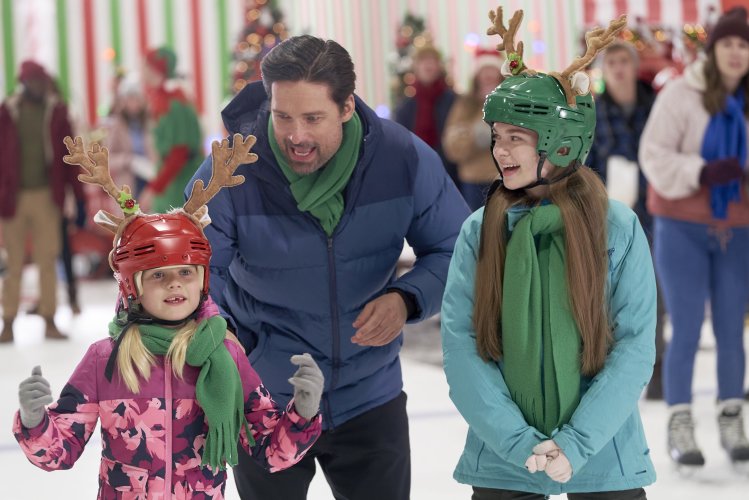 Myla Volk, Warren Christie, and Summer H. Howell in Crashing Through the Snow (2021)