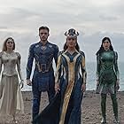 Salma Hayek, Angelina Jolie, Richard Madden, Gemma Chan, Ma Dong-seok, Brian Tyree Henry, Kumail Nanjiani, Lauren Ridloff, Barry Keoghan, and Lia McHugh in Eternals (2021)